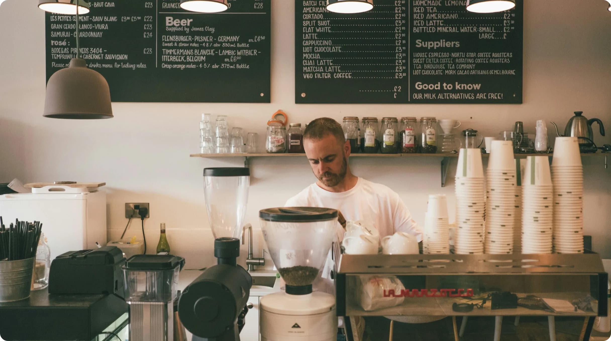 A man running his barista shop.