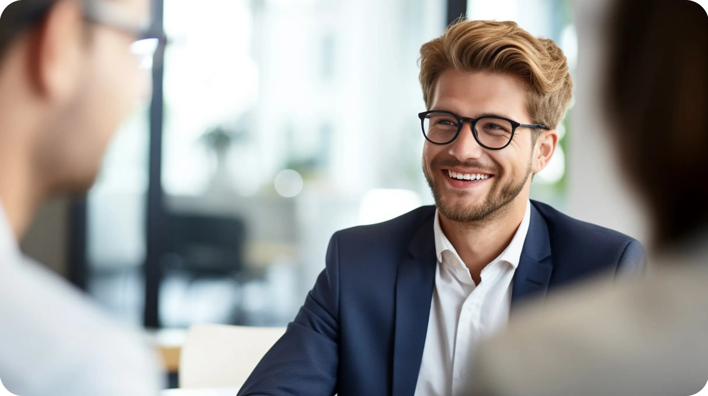 An entrepreneur smiling while having conversation with a contractors