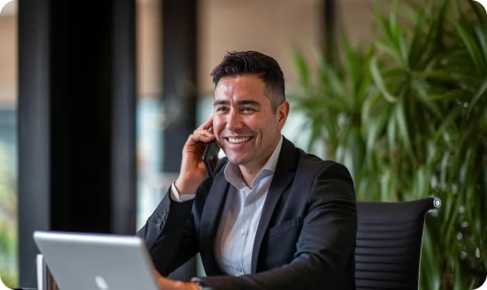 man-in-a-suit-talking-on-the-phone