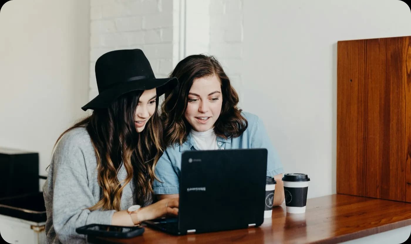 Women working on a laptop at home