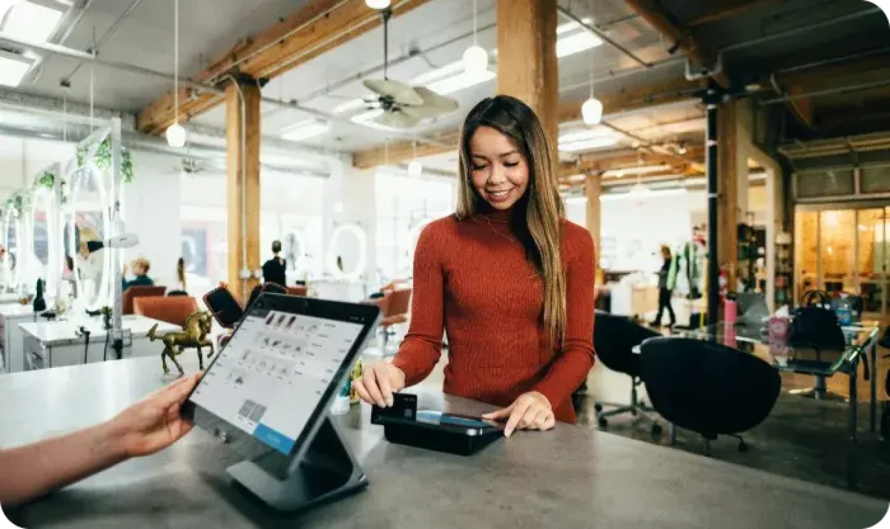 Woman pays via terminal